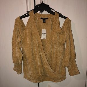 Open shoulder knit sweater. Latte color